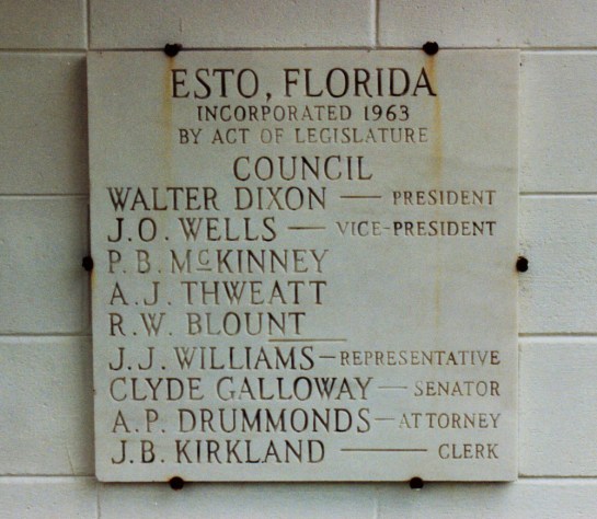 A plaque on the Esto Town Hall commemorates the town's rebirth in 1963.